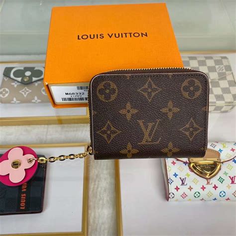 louis vuitton zippy coin purse.